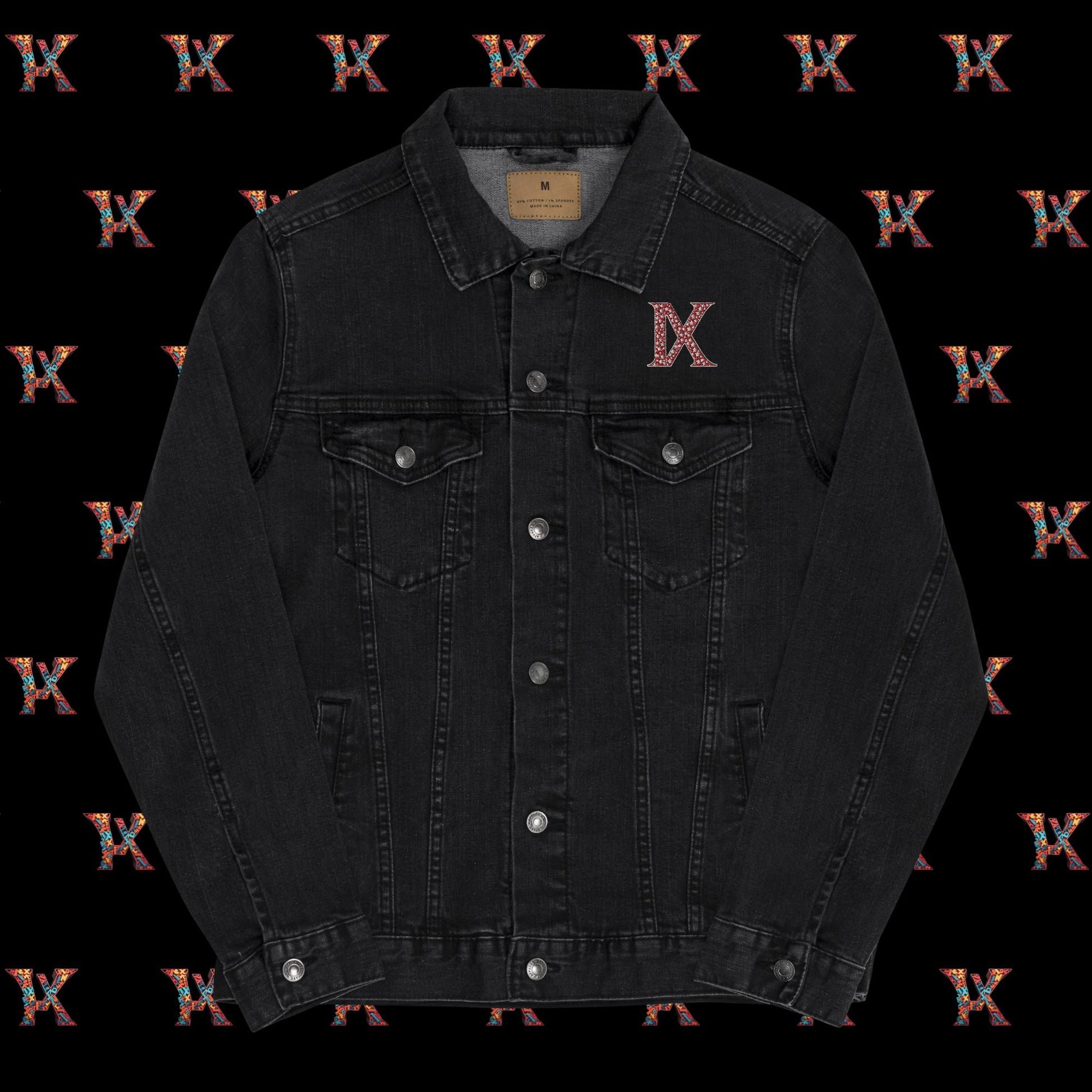 a black jean jacket with the letter x on it